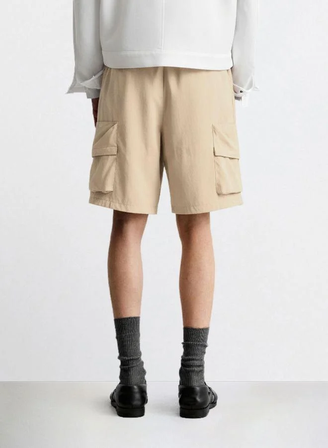 The Indian Garage Co Men Relaxed Fit Solid Cargo Pocket Mid-Rise Cargo Shorts
